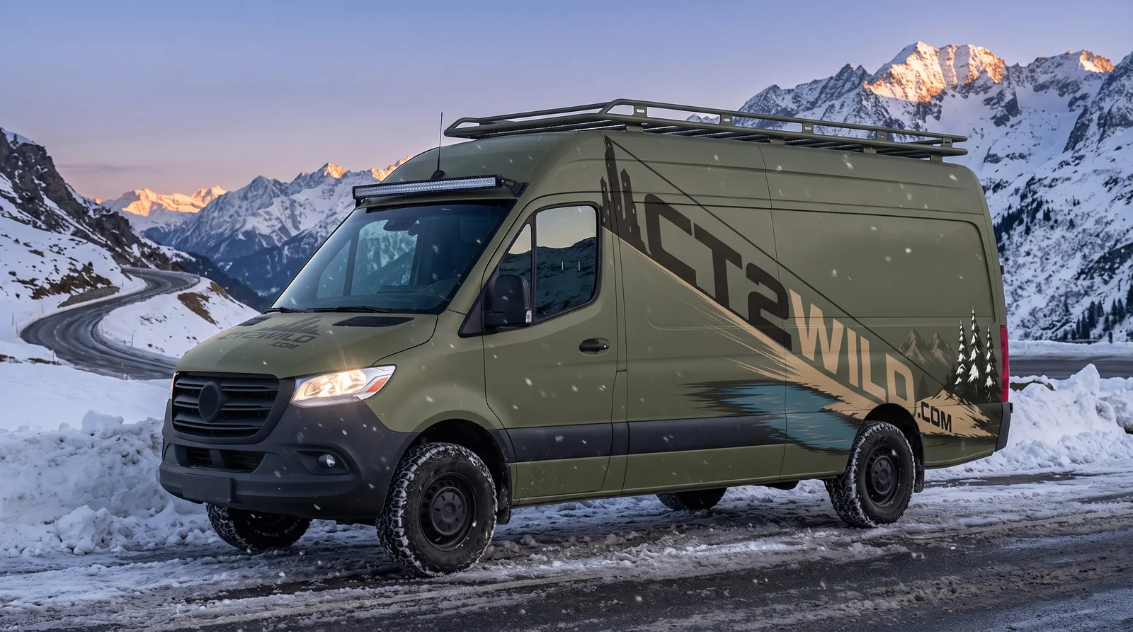 Snowy pass at dusk, light bar on: the panel-van version, no side window.